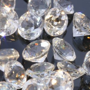 One White Topaz Natural Faceted 5 mm Round Accent Gemstone Averages .69 carat