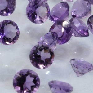 One Amethyst Accent Gemstone 2.5 mm Faceted Round VS Clarity Average .06 carat