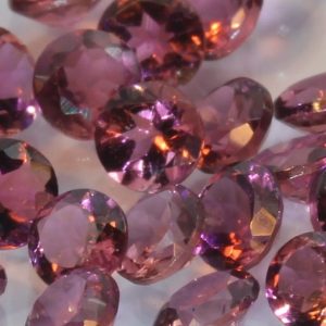 One Pink Tourmaline Accent Gem 2.5 mm Diamond Cut Round Average .06 carat each